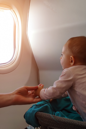 Baby sneaks into Emirates Airline Business Class flight